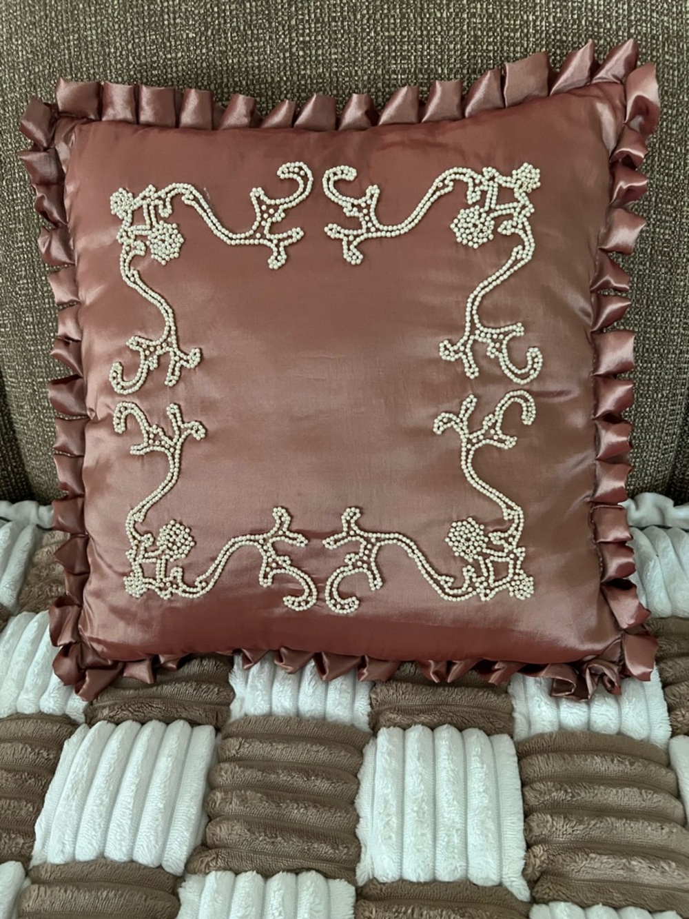 Satin Decorative Pillow in Mauve with Pearl  Beaded Scrollwork ruffled edges.